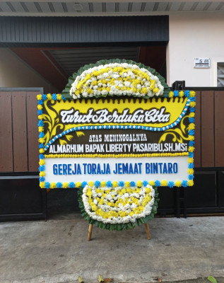 Papan Bunga Duka di Kamurang